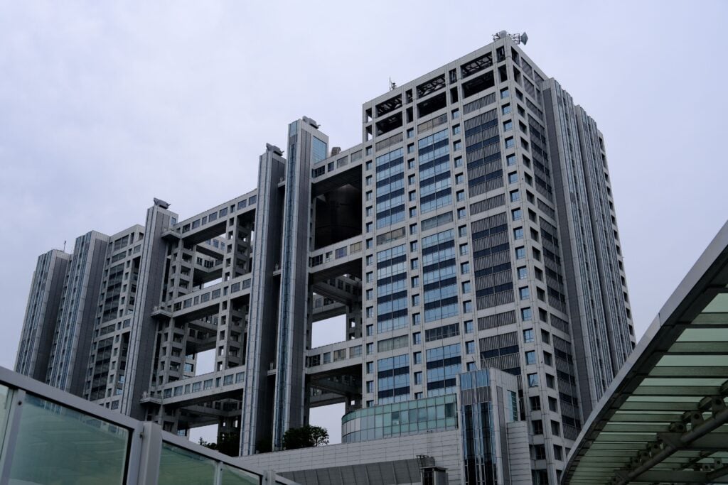 Capture of a modern urban building showcasing innovative architecture in Tokyo, Japan.